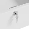 A close-up view of a white drawer with a silver lock and two keys inserted. Náhľad obrázku produktu