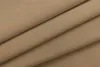 A close-up view of folded fabric, showing its texture and color. Produktbild-Vorschau