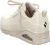 A side view of a beige Skechers sneaker. Voir les images du produit
