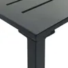 A close-up view of the corner of a black table. Produktbild-Vorschau