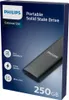The image shows the packaging of a Philips portable SSD. The packaging is dark blue with white text and graphics highlighting the product's features and specifications. Produktbild-Vorschau