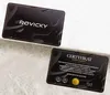 Two black cards with gold trim and text on a light gray and white surface. Náhled obrázku produktu