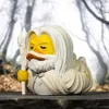 A rubber duck toy dressed as Gandalf the White from Lord of the Rings, standing in a forest setting. Podgląd zdjęcia produktu