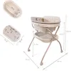 A collage of images showing a baby bathtub with dimensions and a stand, along with a separate bathtub insert with dimensions. Produktbild-Vorschau