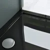 A close-up view of a modern black shower tray with a silver drain cover. Produktbild-Vorschau