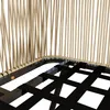 A close-up view of the base of a chair or sofa, showing the woven rope detailing and the black strapping that forms the seat support. Náhľad obrázku produktu