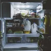 Inside of a refrigerator filled with food items. Anteprima dell’immagine prodotto