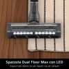 A close-up of a vacuum cleaner head with LED lights, shown on a wooden floor and a rug. Náhled obrázku produktu