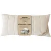 A cream-colored pillow with a product label attached. Produktbild-Vorschau