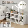 A white cube shelf unit is shown in a room setting, next to a bed. Decorative items and books are placed on and in the shelves. There are also marketing overlays and text. Produktbild-Vorschau