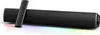 A black soundbar with a remote control resting on top, set against a white background with colorful lighting effects at the bottom. Náhled obrázku produktu
