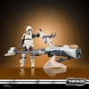 A Star Wars Scout Trooper action figure with a speeder bike, displayed on a stand against a gradient background. Náhled obrázku produktu