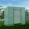 A green greenhouse in a garden setting. Produktbild-Vorschau