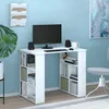 A white desk with a computer monitor, speakers, and a mug, set against a light blue wall. Podgląd zdjęcia produktu