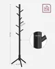 A black tree-shaped coat rack with dimensions and weight capacity indicated by overlaid text and graphics. Náhled obrázku produktu