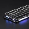 A close-up, angled view of a gaming keyboard with illuminated blue accents. Produktbild-Vorschau