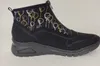 A side view of a black sneaker boot with a balloon pattern on the upper. Produktbild-Vorschau
