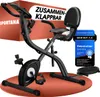 A black foldable exercise bike is displayed on an orange circular mat, with a red box in the background. There are also marketing badges and text overlays. Produktbild-Vorschau