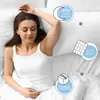 A woman is sleeping in a bed, with marketing graphics overlaid on the image. Produktbild-Vorschau