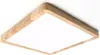 A square LED ceiling light with a wooden frame against a white background. Podgląd zdjęcia produktu