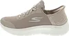 A side view of a beige Skechers slip-on shoe. Anteprima dell’immagine prodotto