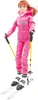 A doll dressed in a pink ski suit, wearing goggles, and holding ski poles, standing on skis. Náhľad obrázku produktu