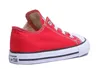 A single red Converse Chuck Taylor All Star sneaker is shown from the side against a white background. Voir les images du produit