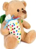 A teddy bear sitting down, holding a cone-shaped bag with colorful polka dots. Produktbild-Vorschau