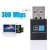 A promotional image for a 300 Mbps wireless USB adapter, showing the adapter alongside stylized representations of a laptop, tablet, and smartphone connected via Wi-Fi. Produktbild-Vorschau