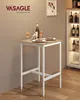 A bar table set for two in a dining area, with wine bottles and glasses on top, and a display cabinet with wine bottles in the background. Produktbild-Vorschau
