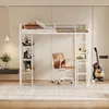 A loft bed with a desk and shelves underneath, set up in a room with a chair and a guitar. Anteprima dell’immagine prodotto
