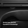 A close-up, abstract view of a black toilet seat, highlighting its design. Produktbild-Vorschau