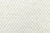 A close-up view of a cream-colored rug with a textured, looped pile. Anteprima dell’immagine prodotto