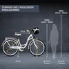 A white bicycle with a basket is shown next to a silhouette of a person, with various measurements and height recommendations indicated by text and lines. Produktbild-Vorschau