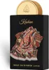 A black perfume bottle with a gold cap and a detailed image of a rug on the front. Produktbild-Vorschau