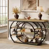 A console table with circular shelving is displayed in a room setting, decorated with various items. Anteprima dell’immagine prodotto