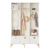 A white entryway cabinet with shelves, hooks, and drawers, decorated with a few items. Anteprima dell’immagine prodotto