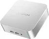 A white GEEKOM mini PC is shown from a slightly elevated front-left angle against a white background. Produktbild-Vorschau