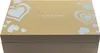 A closed box with a lid, decorated with hearts and the brand name. Produktbild-Vorschau
