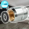 A close-up shot of a metal adapter and a rubber washer, with a blurred background of what appears to be a bathroom or kitchen. Produktbild-Vorschau