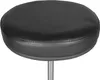 A close-up studio shot of a black, round, padded stool. Produktbild-Vorschau