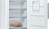 The interior of a white Bosch Serie 6 refrigerator freezer, showing multiple drawers and a control panel. Produktbild-Vorschau
