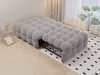 A gray sofa bed is shown in a room with a plant and curtains in the background. Náhľad obrázku produktu