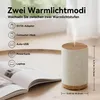 A humidifier with text overlays describing its features and power sources. Produktbild-Vorschau