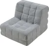 A single gray upholstered floor chair with a backrest is shown against a white background. Náhled obrázku produktu