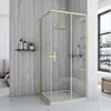 A modern bathroom with a gold-framed glass shower enclosure. Podgląd zdjęcia produktu