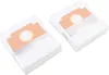 Two stacks of white vacuum cleaner bags with brown cardboard inserts. Produktbild-Vorschau