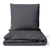 A folded duvet and a pillow with a striped pattern. Produktbild-Vorschau