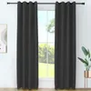 Two dark gray curtains are hanging in front of a window with trees visible outside. Produktbild-Vorschau