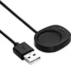A black USB charging cable with a round charging puck for a smartwatch. Náhled obrázku produktu